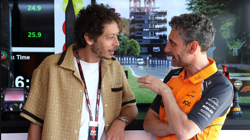 Суперчемпион MotoGP Валентино Росси и руководитель команды McLaren Андреа Стелле 