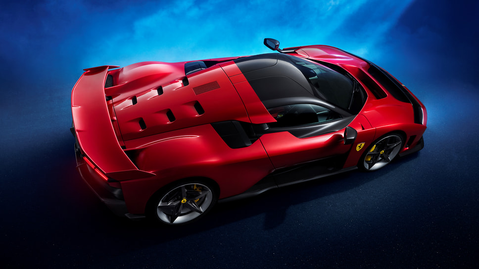 &lt;b>Ferrari F80. Red Dot 2025 Best of the Best.&lt;/b> Архитектура салона суперкара, описывается как 1+. Иными словами, есть водитель, и есть еще кто-то или что-то — пассажир или сумка. Второе сиденье слегка смещено назад, подчеркивая приоритет водителя. Новшество повлияло на пропорции, сузив кабину и визуально расширив «плечи» машины
